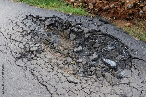 Fototapeta asphalt road with cracks