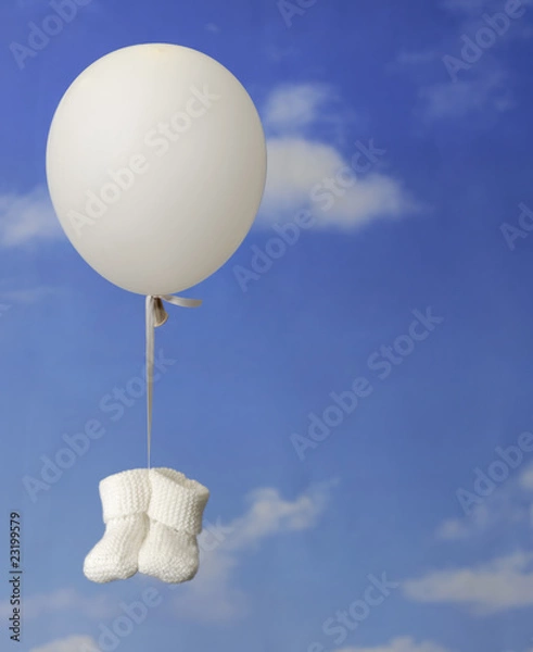 Obraz concept de naissance: chaussons de bébé pendu a un ballong