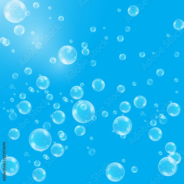 Obraz Realistic soap bubbles with rainbow reflection set isolated on the blue background.