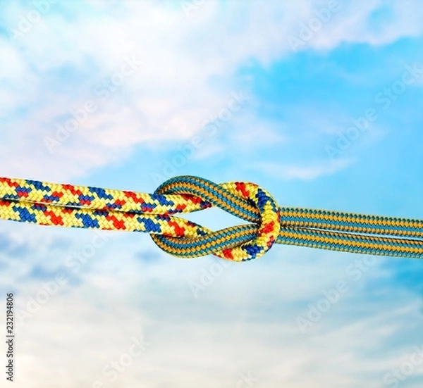 Fototapeta Knot on a cord close up on