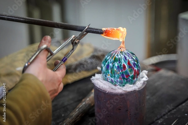 Obraz A Beautiful Glass Ball Being Made by a Glass Blower