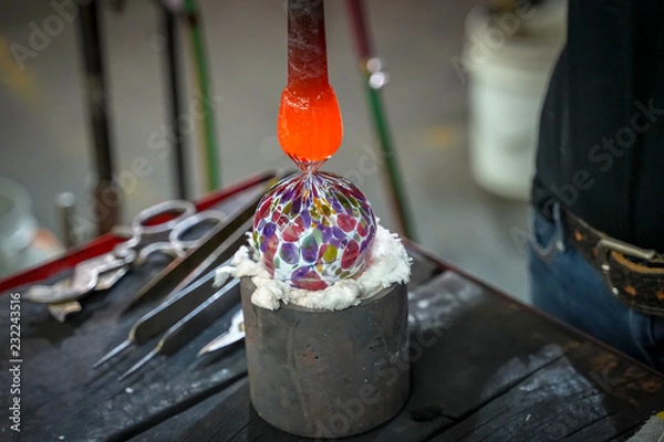 Obraz A Beautiful Glass Ball Being Made by a Glass Blower