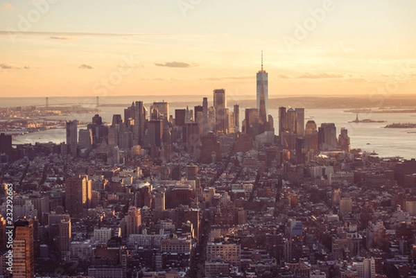 Fototapeta New York City - Manhattan downtown skyline skyscrapers at sunset and twilight. View from Empire State Building Platform. USA.