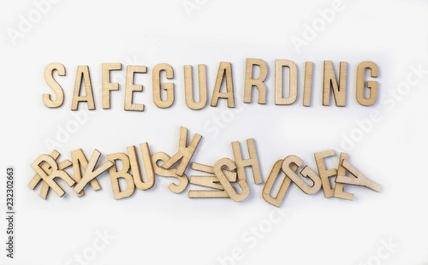 Obraz Safeguarding concept, word spelled out in wooden letters