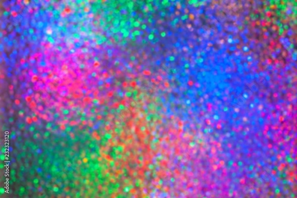Fototapeta abstract colorful lights for celebration textured glass, blurred