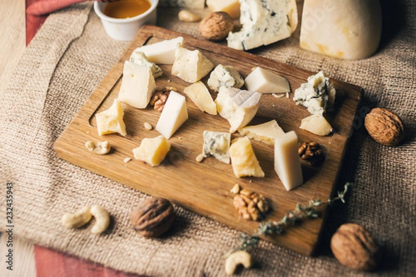 Fototapeta cheese plate with honey