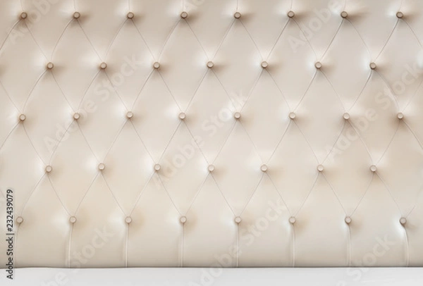 Fototapeta Soft headboard and white bedding sheets