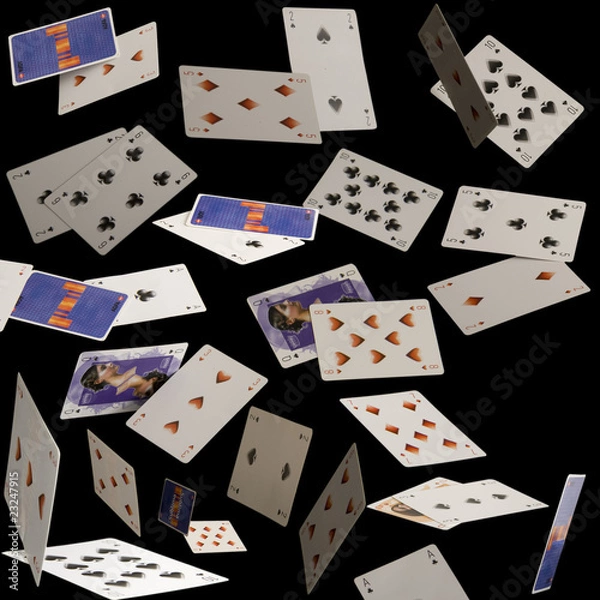 Obraz Flying cards on a black background