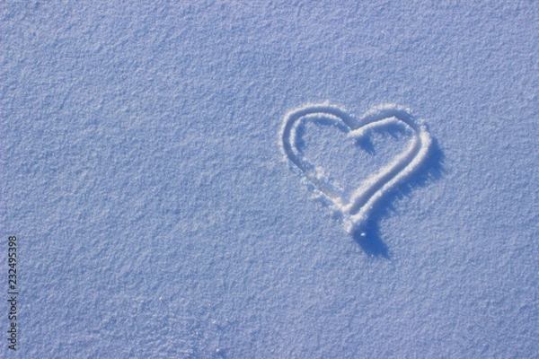 Fototapeta Symbol Of Heart Painting On The Snow. Heart On White Snow. Love, Valentine Day Concept.  Abstract Love.
