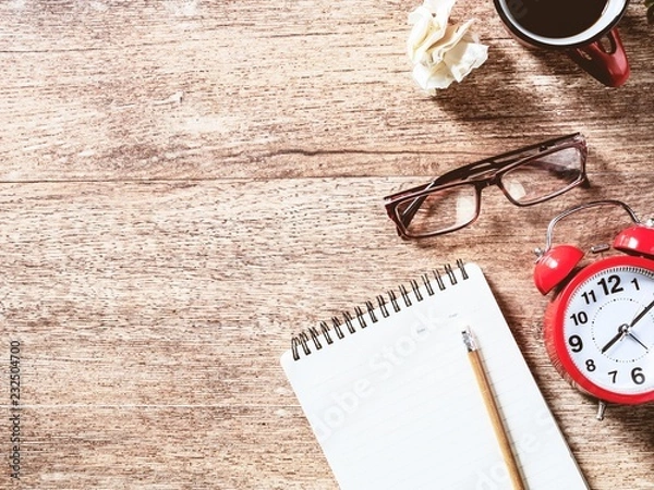 Fototapeta Flat lay Office desk table Top view with paper glasses cup coffee copy space