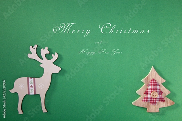 Fototapeta Greeting card with a Merry Christmas tree and snow, a symbol of the holiday, family togetherness. Happy New Year.