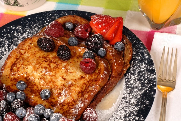 Fototapeta french toast with fruit and maple syrup closeup