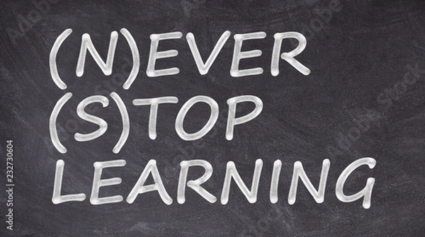 Obraz Never stop learning written on blackboard