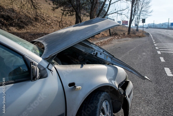 Fototapeta Side view of a damaged car after side collision.