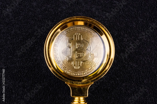 Fototapeta bitcoin under the magnifying glass