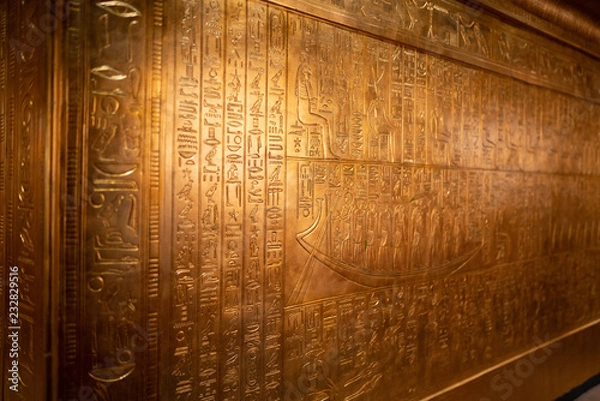 Fototapeta Tomb of ancient Egyptian pharaoh king Tutankhamen covered with carved out hieroglyphs