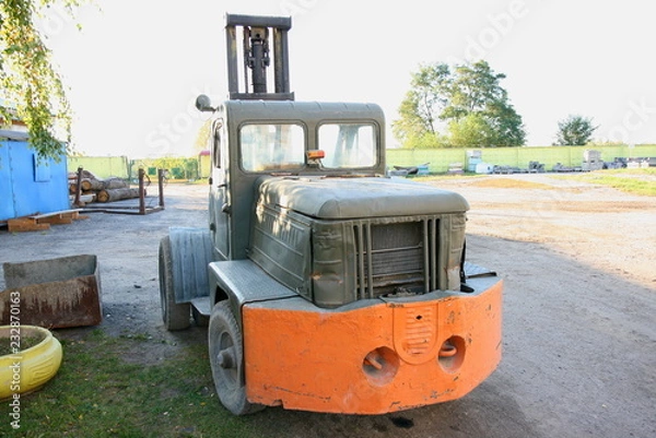 Obraz Old car loader. Front view.
