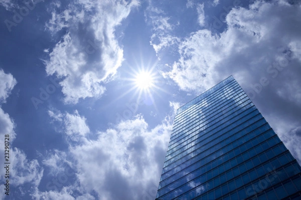 Fototapeta 太陽とオフィスビル