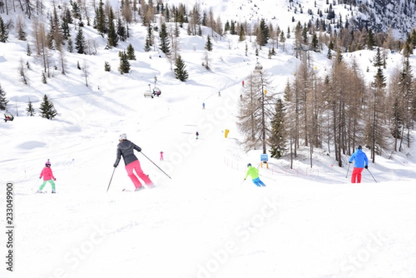 Obraz ski slope with skiers in the Alps