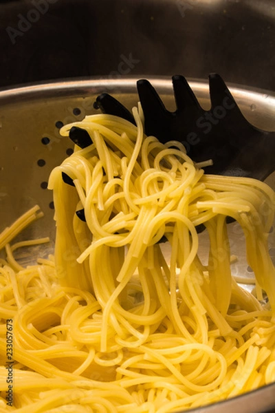 Obraz Spaghetti Noodles with Strainer