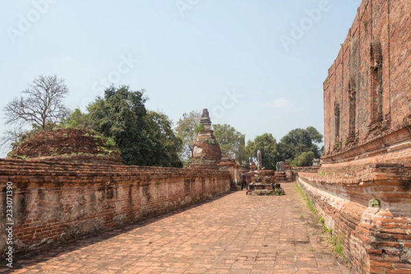 Fototapeta ancient old brick path way in temple