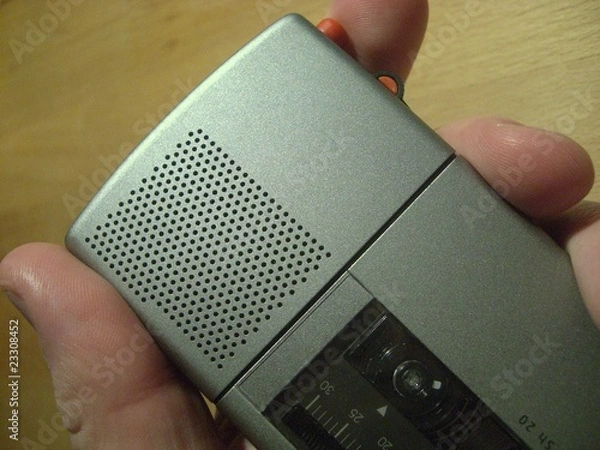 Obraz Diktiergerät in der Hand