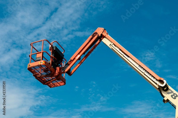 Obraz lifter against blue sky