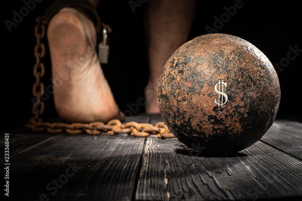 Obraz Money are ball on the leg. Concept of fear.