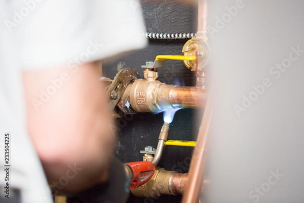 Obraz Plumber with Torch