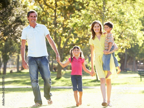 Fototapeta Family Enjoying Walk In Park