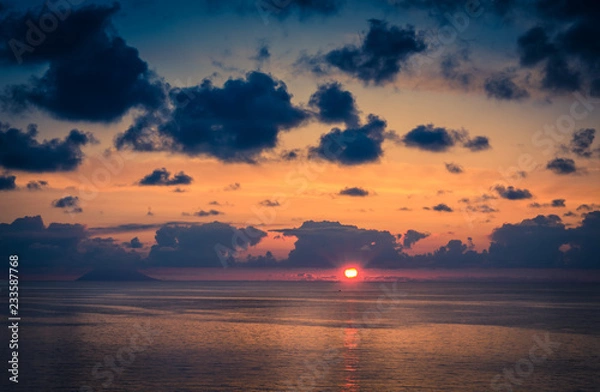 Fototapeta Aerial view of beautiful amazing sea sunset with color dramatic sky