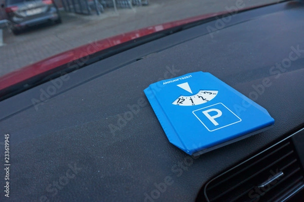 Obraz Parking disc on dashboard panel