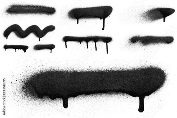 Fototapeta Realistic grunge graffiti spray paint effect on the white wall background. Isolated black ink texture.
