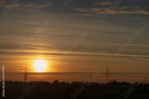 Obraz Sonnenuntergang mit Strommasten