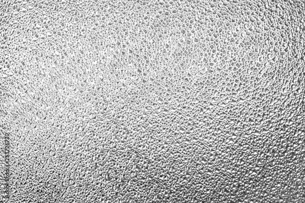 Fototapeta Structural glass surface in black and white. Fine texture on the glass have geometric shapes.