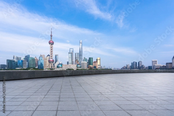 Fototapeta emtpy square with city skyline