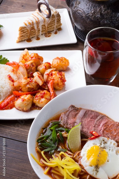 Fototapeta Asian lunch served on a wooden table