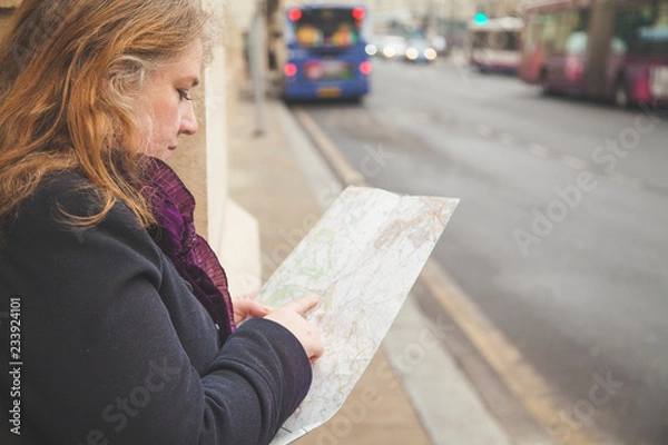 Obraz Women map reading in city
