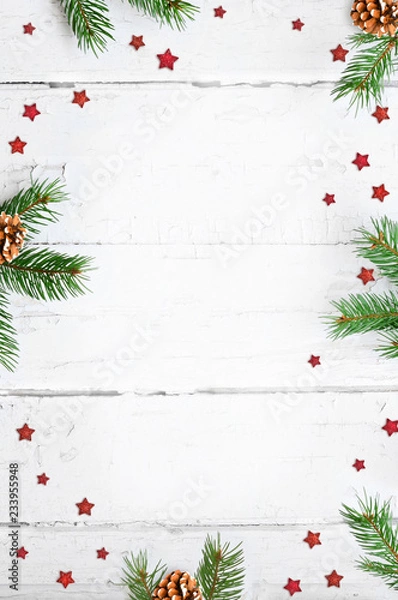 Fototapeta Christmas background and fir tree branches. Top view