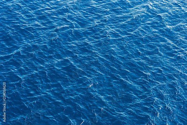 Obraz Background of rippled blue sea surface.