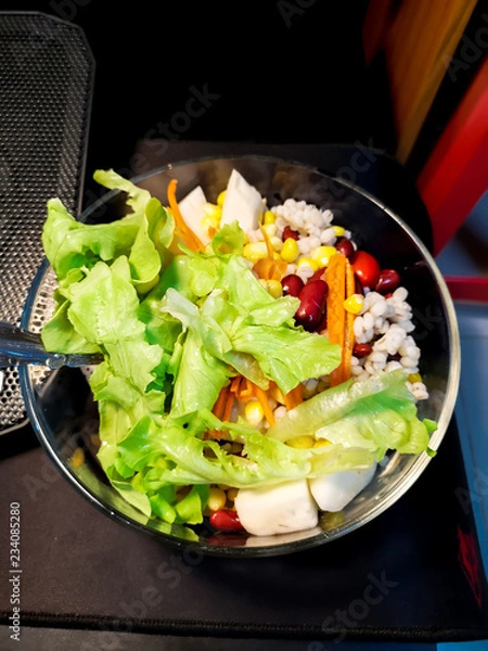 Fototapeta Fresh mixed vegetables salad and bright colors to eat.