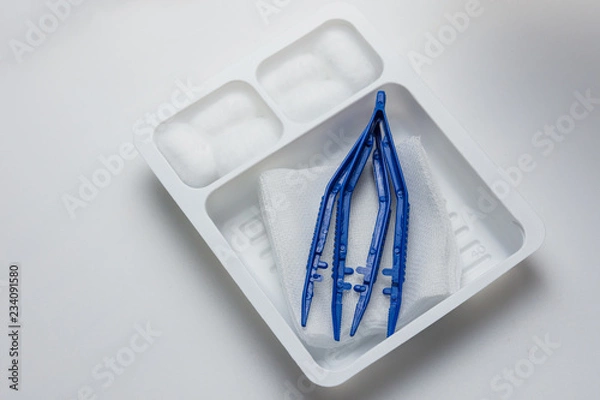 Obraz Disposable sterile dressing set on white table