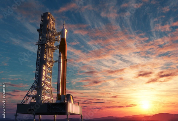 Fototapeta Space Launch System On Launchpad Over Background Of Sunrise