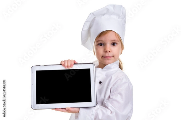 Fototapeta Girl chef white uniform isolated on white background. Showing the empty black ipad screen, looking at the camera. Landscape image