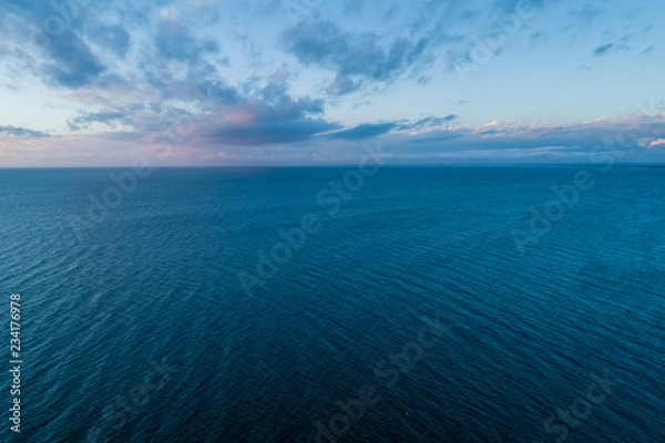Obraz Minimalistic seascape - clouds over water at dusk