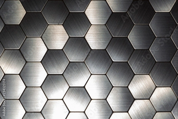 Fototapeta Modern background with a metal hexagons and a black outline. Macro shot