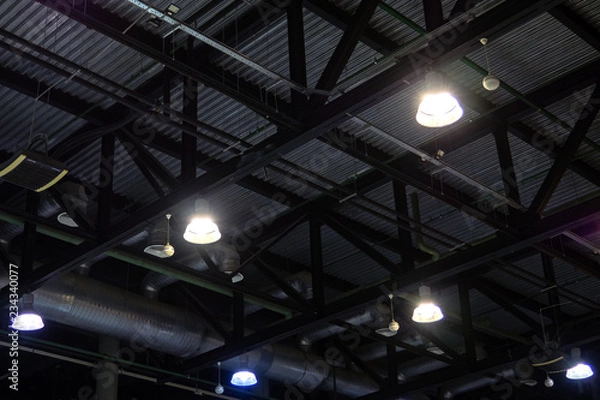 Obraz Lights and ventilation system in ceiling of the dark office industrial building, exhibition Hall Ceiling construction