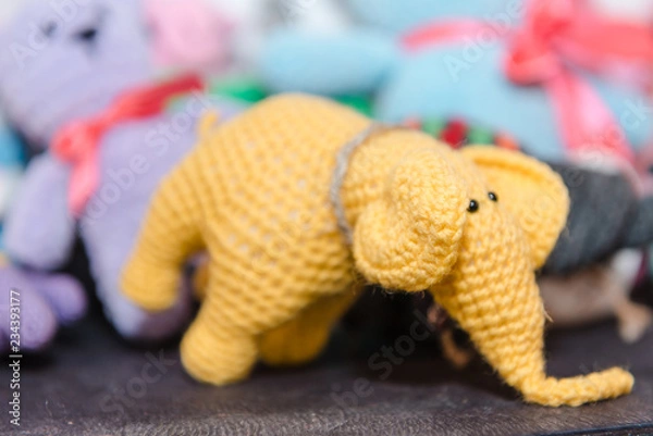 Obraz Knitted children's toys. Hand-made toys as a gift.