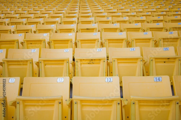 Fototapeta Yellow seats at the stadium