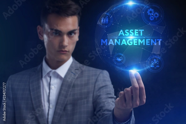 Fototapeta The concept of business, technology, the Internet and the network. A young entrepreneur working on a virtual screen of the future and sees the inscription: Asset management